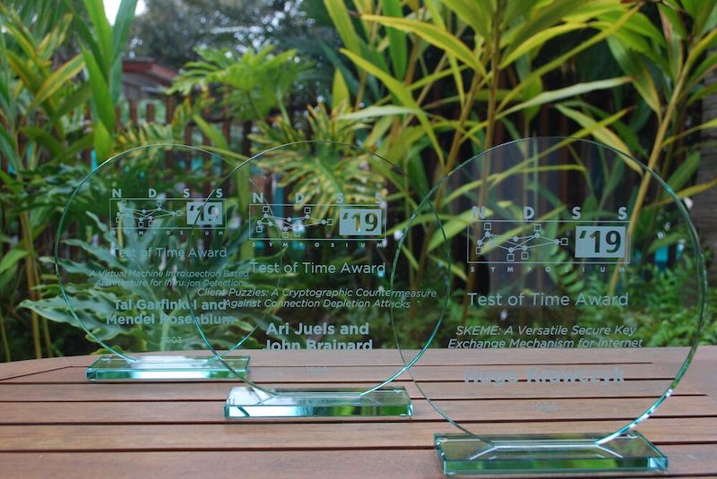 test of time award plaques on a table